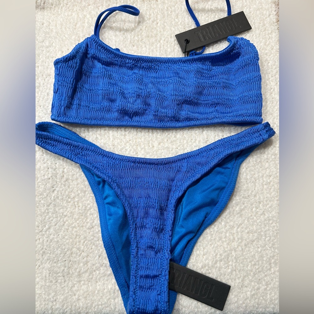 NWT blue Triangl Mica bikini w/ zipper bag. Medium top and small bottom.